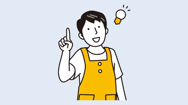 いいこと思いついたエプロンの男性