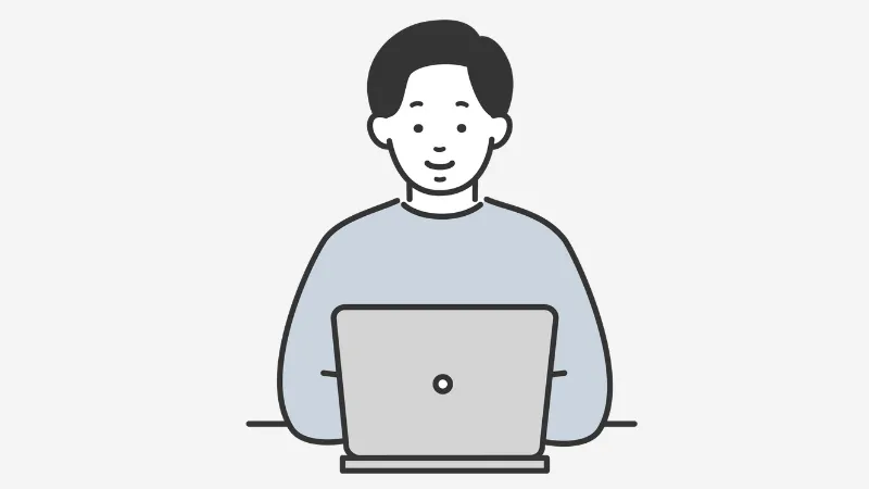 PCでWeb制作する男性