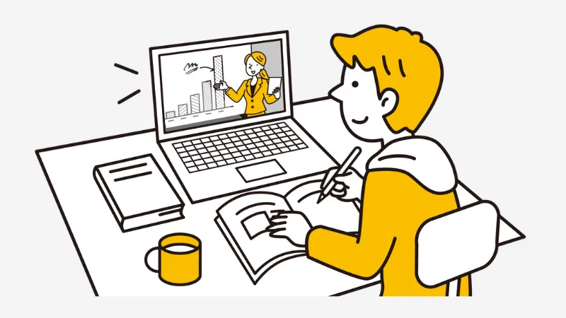 PCで勉強する男性